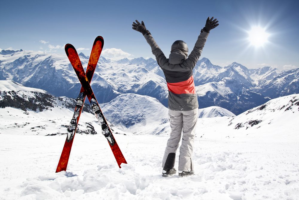 Cute skier girl ski winter sport resort holidays skiing mountain