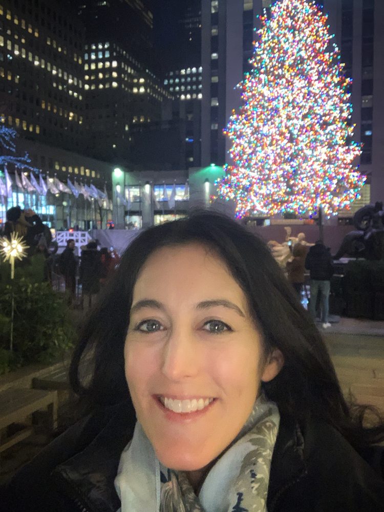 selfie in front of the Rockefeller Center Christmas tree in NYC